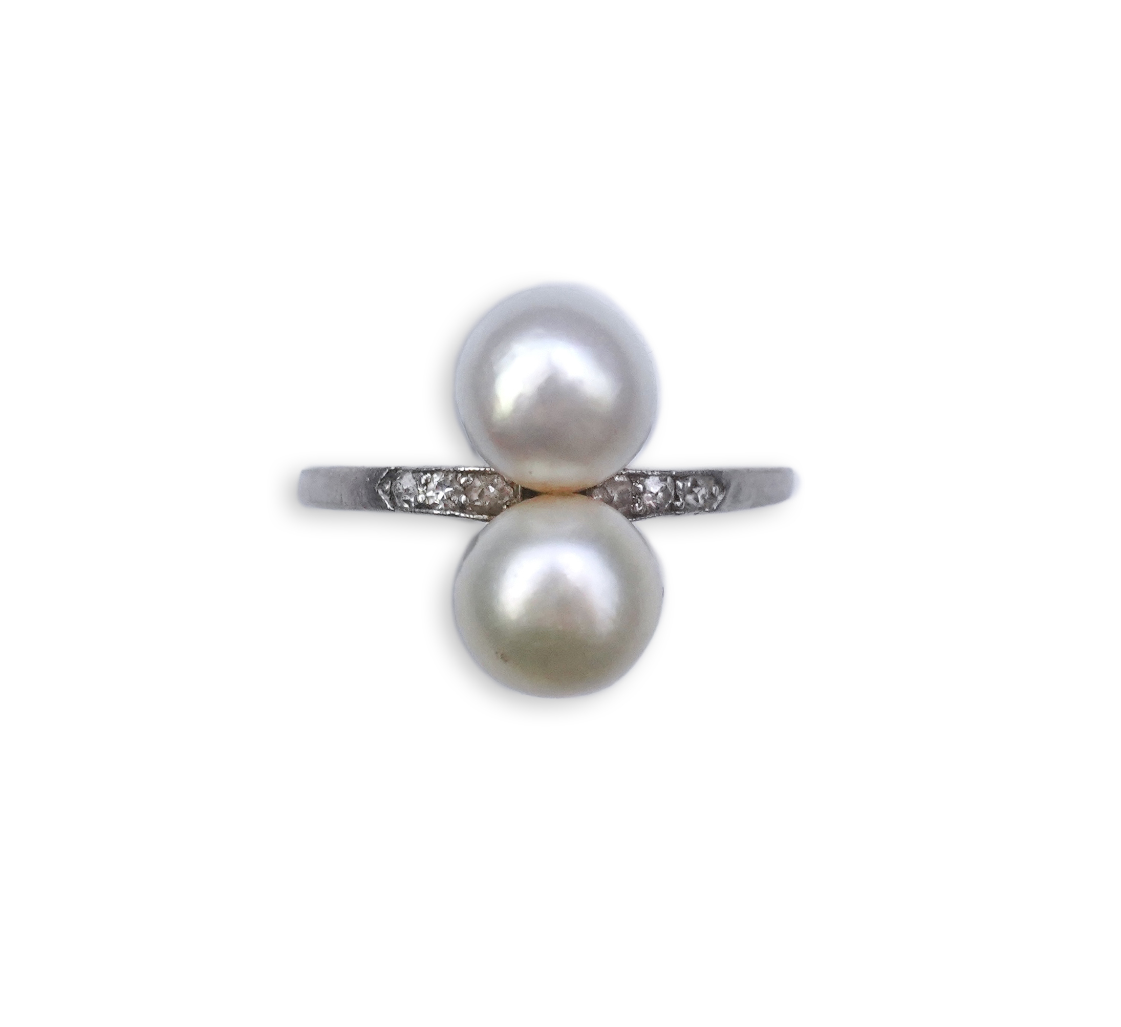 A pearl and diamond toi-et-moi ring, circa 1920